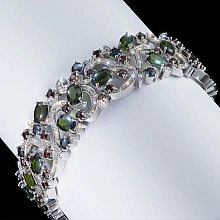 Браслет из белого золота с хромдиопсидами, сапфирами, бриллиантами и гранатами