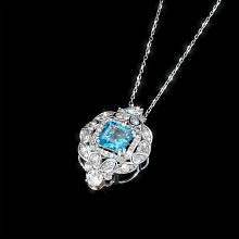 Подвеска из белого золота с бриллиантами и топазом