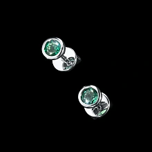 Пусеты из белого золота с изумрудами