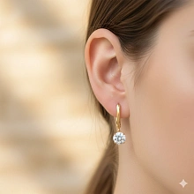 Серьги из желтого золота с бриллиантом