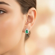 Серьги из белого золота с изумрудами и бриллиантами